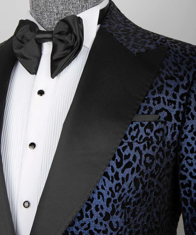 Tuxedo with black bow tie and leopard print lapel on a mannequin.