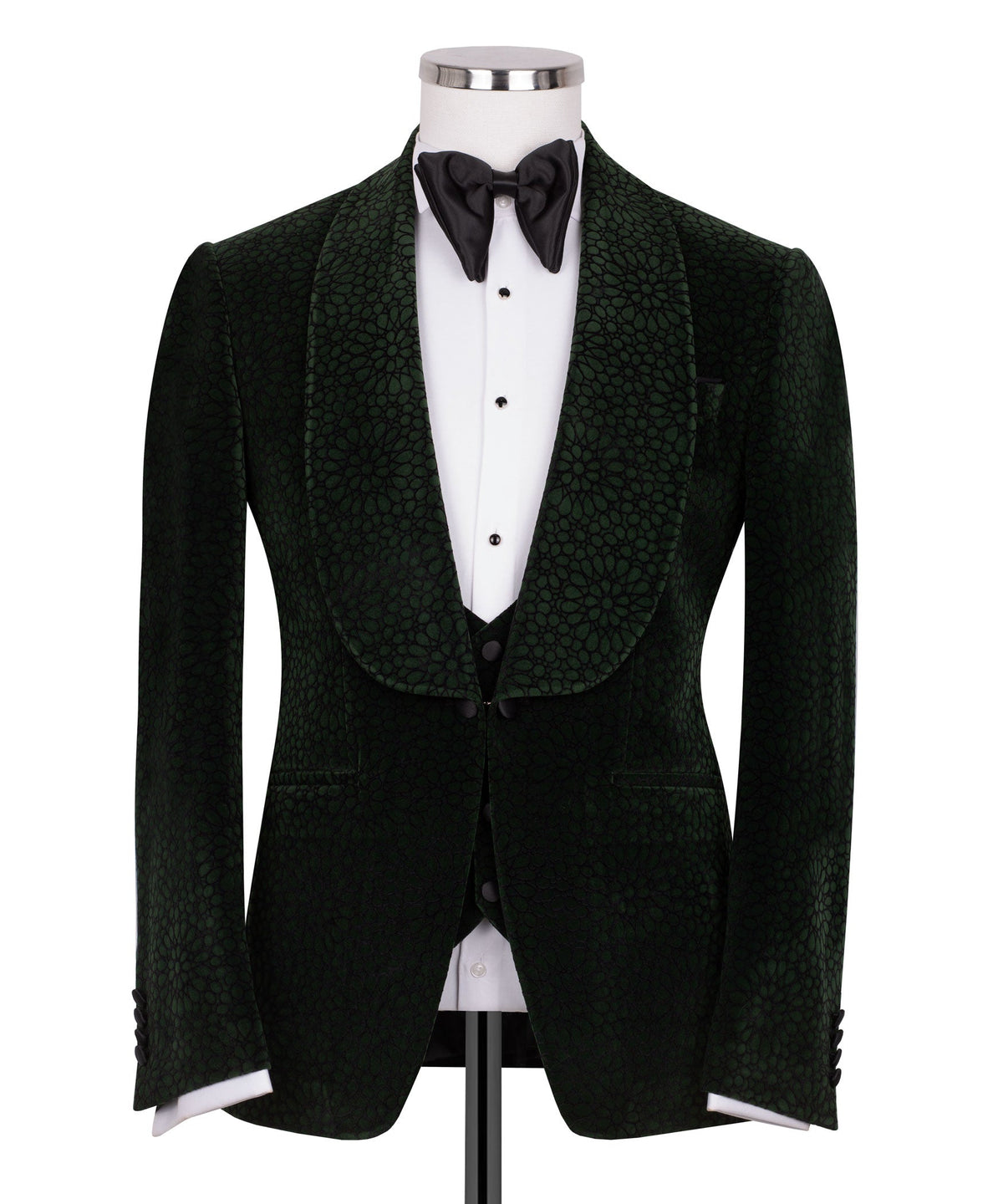 Green velvet tuxedo jacket with black vest and black bow tie, tailored formal look