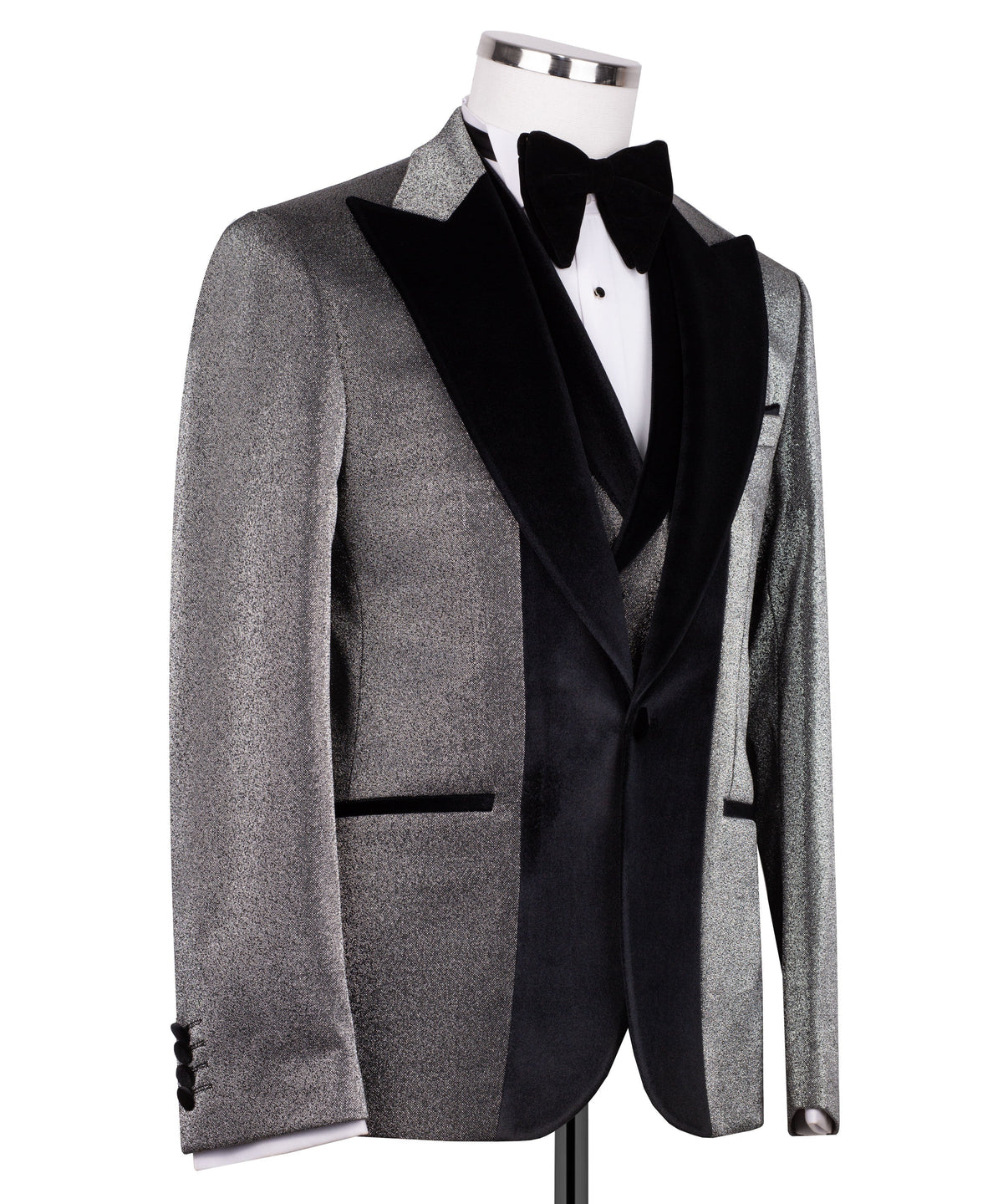 Black tuxedo jacket with velvet collar, satin lapels, and bow tie