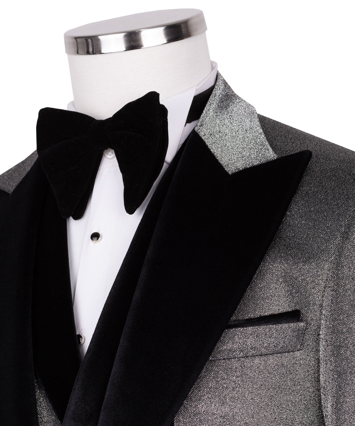 Close-up: black velvet bow tie and satin lapels on tuxedo jacket