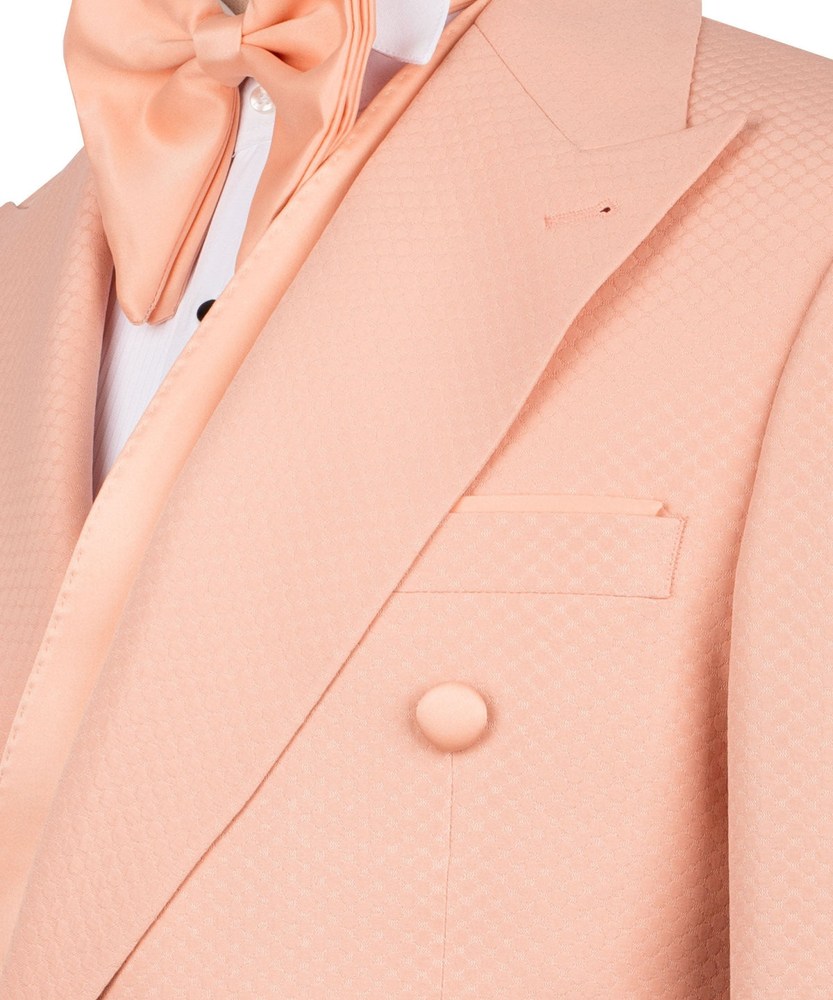 Peach shawl lapel tux jacket close-up with breast pocket and bow tie at neckline