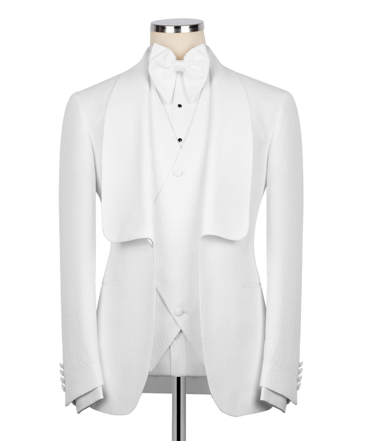White tuxedo jacket, matching waistcoat and bow tie set on mannequin