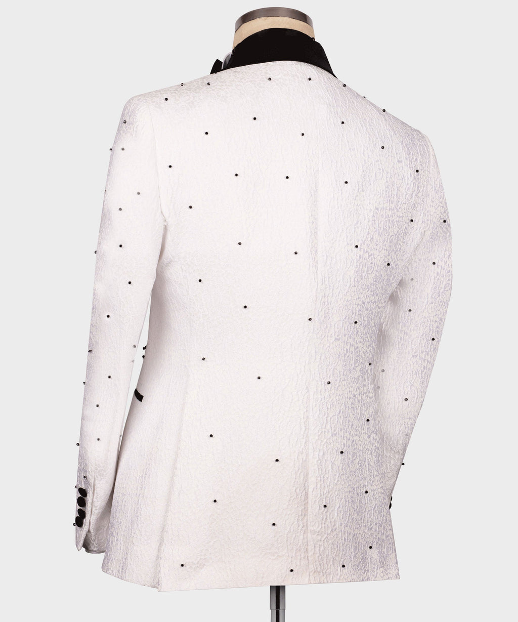 Back view of white tuxedo jacket with small black dot pattern