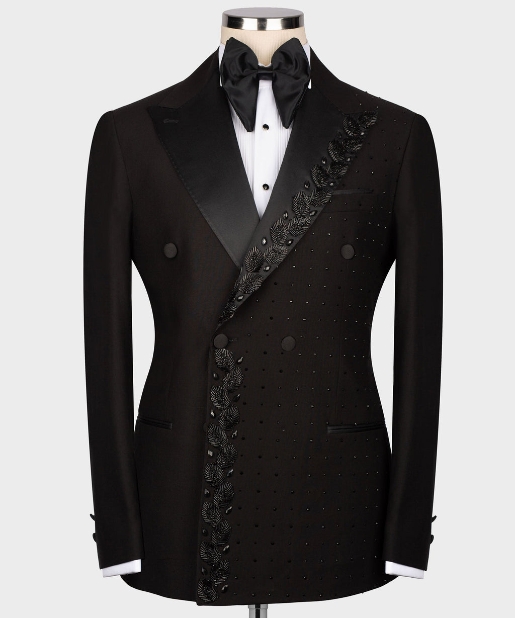 Black tuxedo jacket with jeweled diagonal trim and black satin bow tie