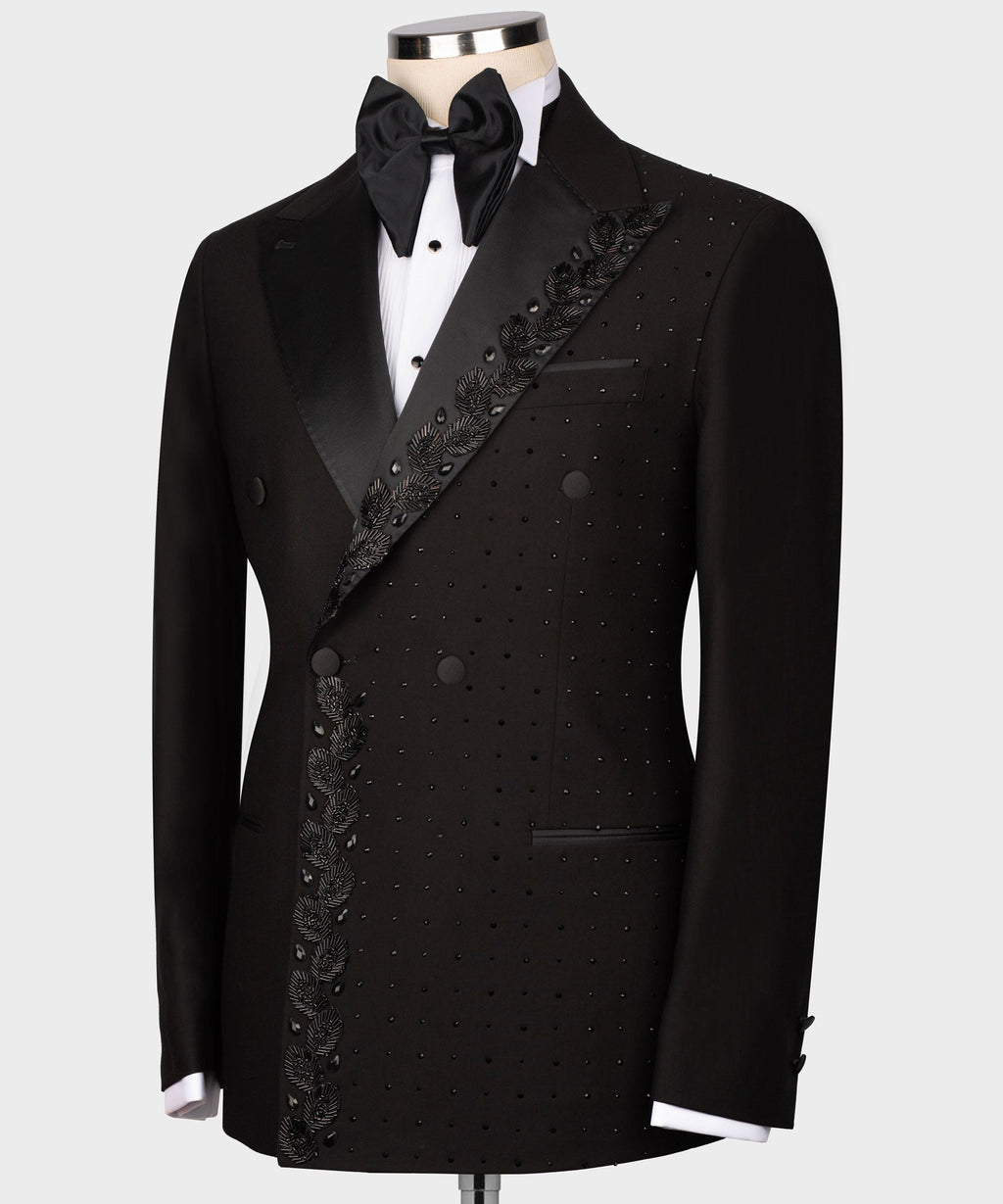 Black tuxedo jacket with satin bow tie; studded patterned diagonal lapel panel