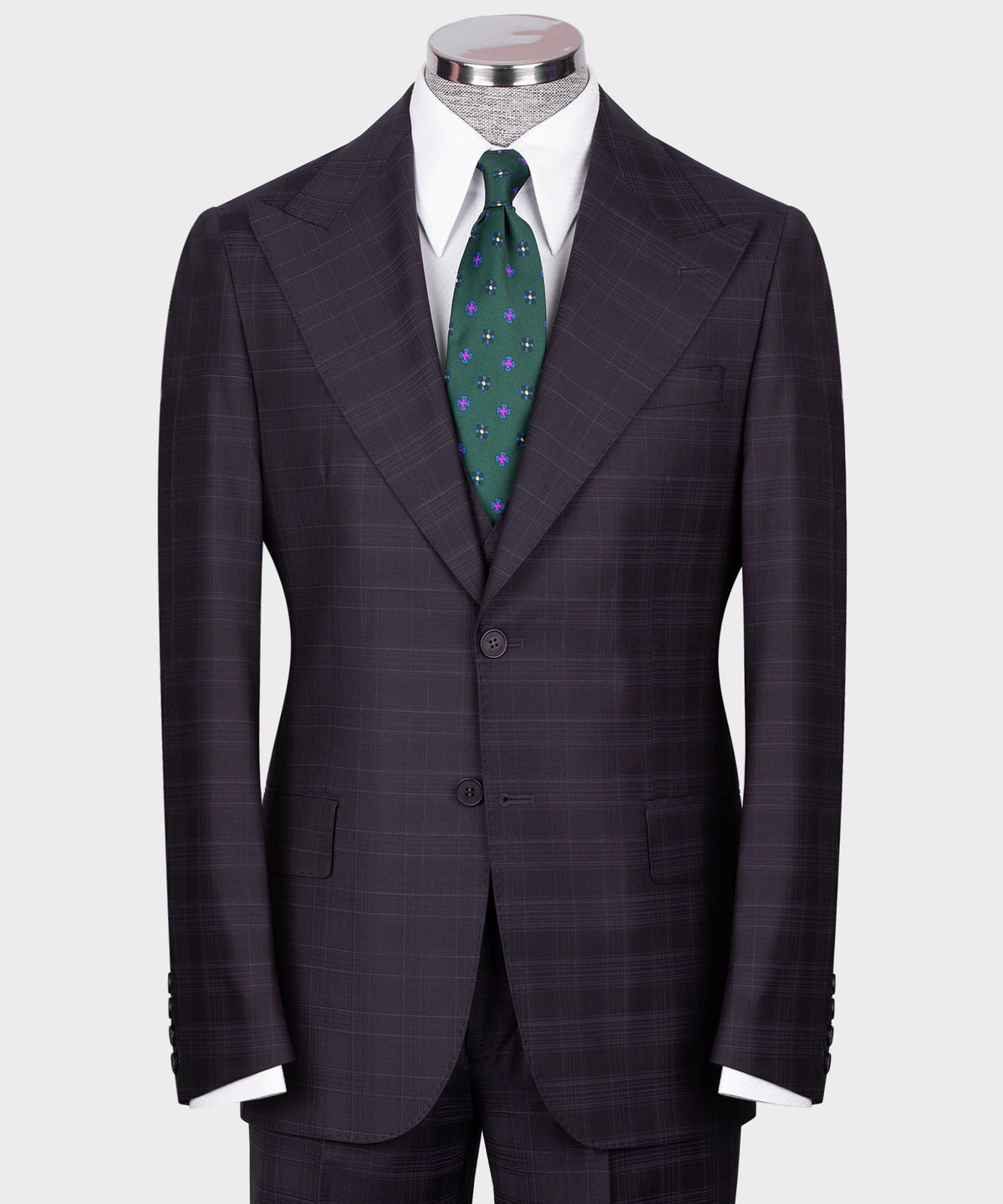 Navy plaid vest suit with white shirt and green patterned tie, single-breasted front