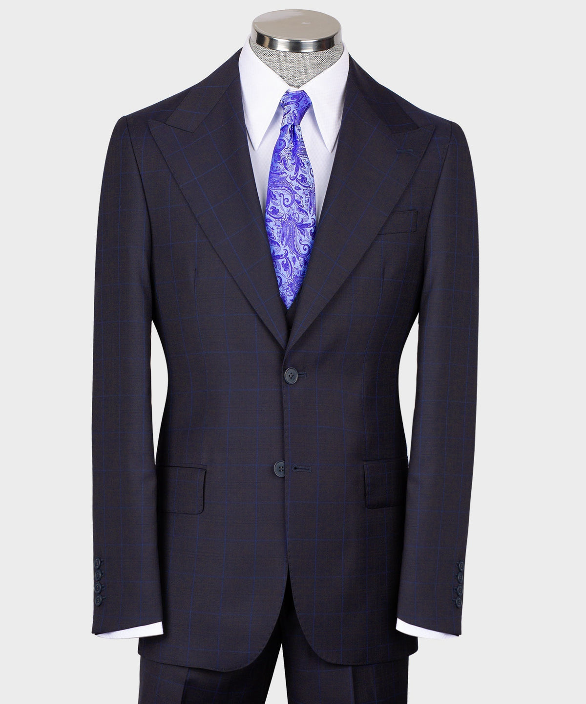 Men’s dark windowpane vest suit with purple paisley tie and matching jacket