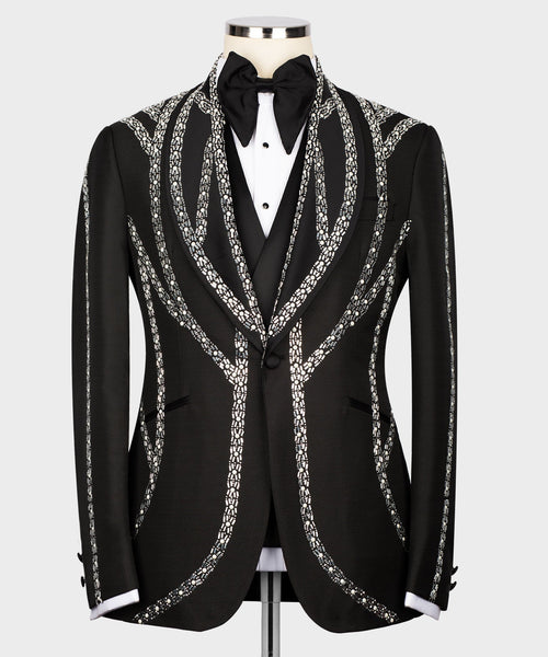 Black tuxedo jacket with silver embroidered trim, bow at neckline