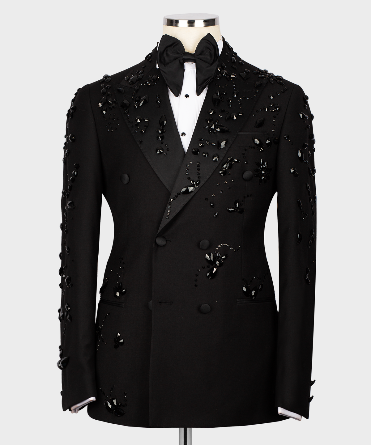 Black tuxedo suit jacket with bow tie, jeweled embellishment and satin lapels