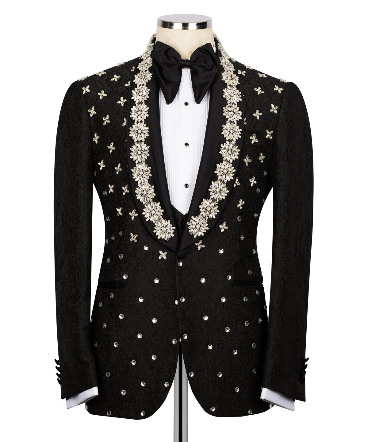 Black tuxedo jacket with central floral vine embroidery and bow at neckline over vest