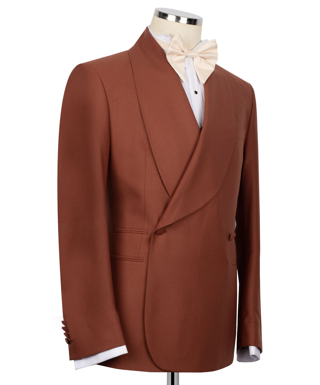 Brick color tuxedo jacket with white shirt front and bow tie, welt pockets