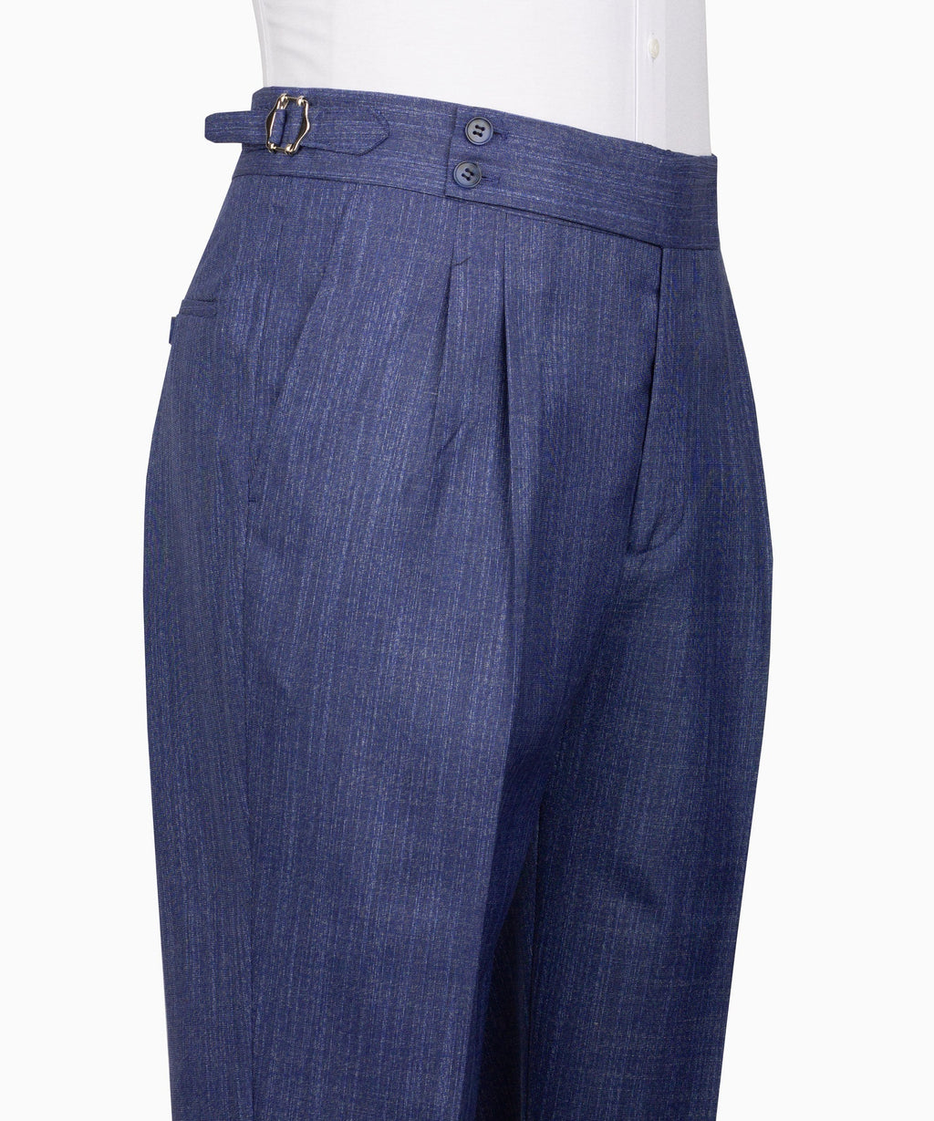 Blue plaid dress pants with front pleats, belt loops, and zip fly with button closure