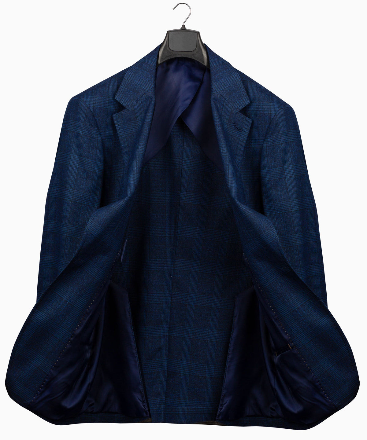 Navy plaid suit jacket back view with center seam and vented hem