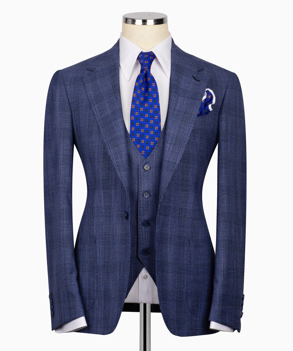 Blue plaid three-piece suit jacket with matching vest and blue patterned tie