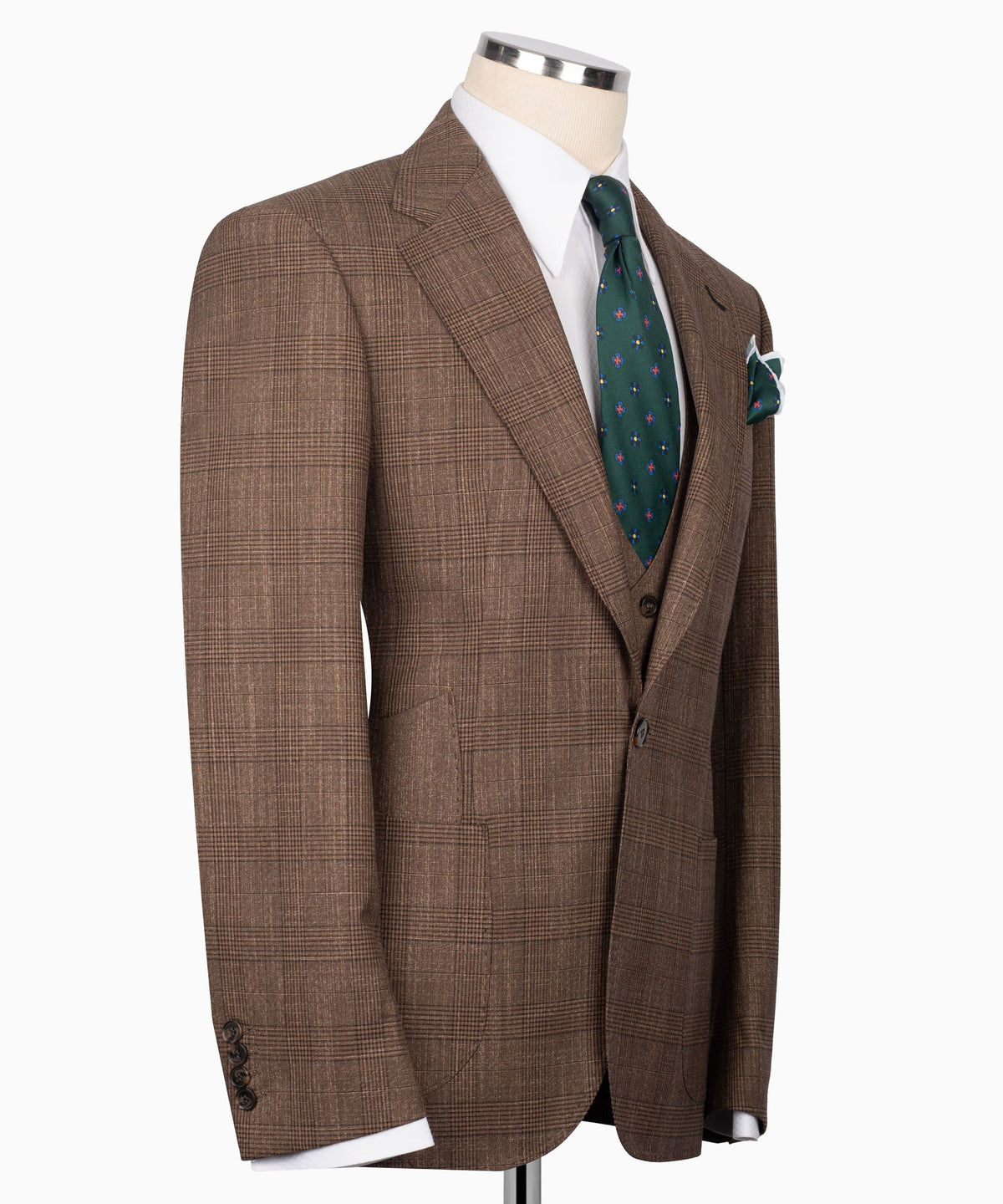 Brown plaid suit jacket with notched lapel, breast pocket, and green patterned tie