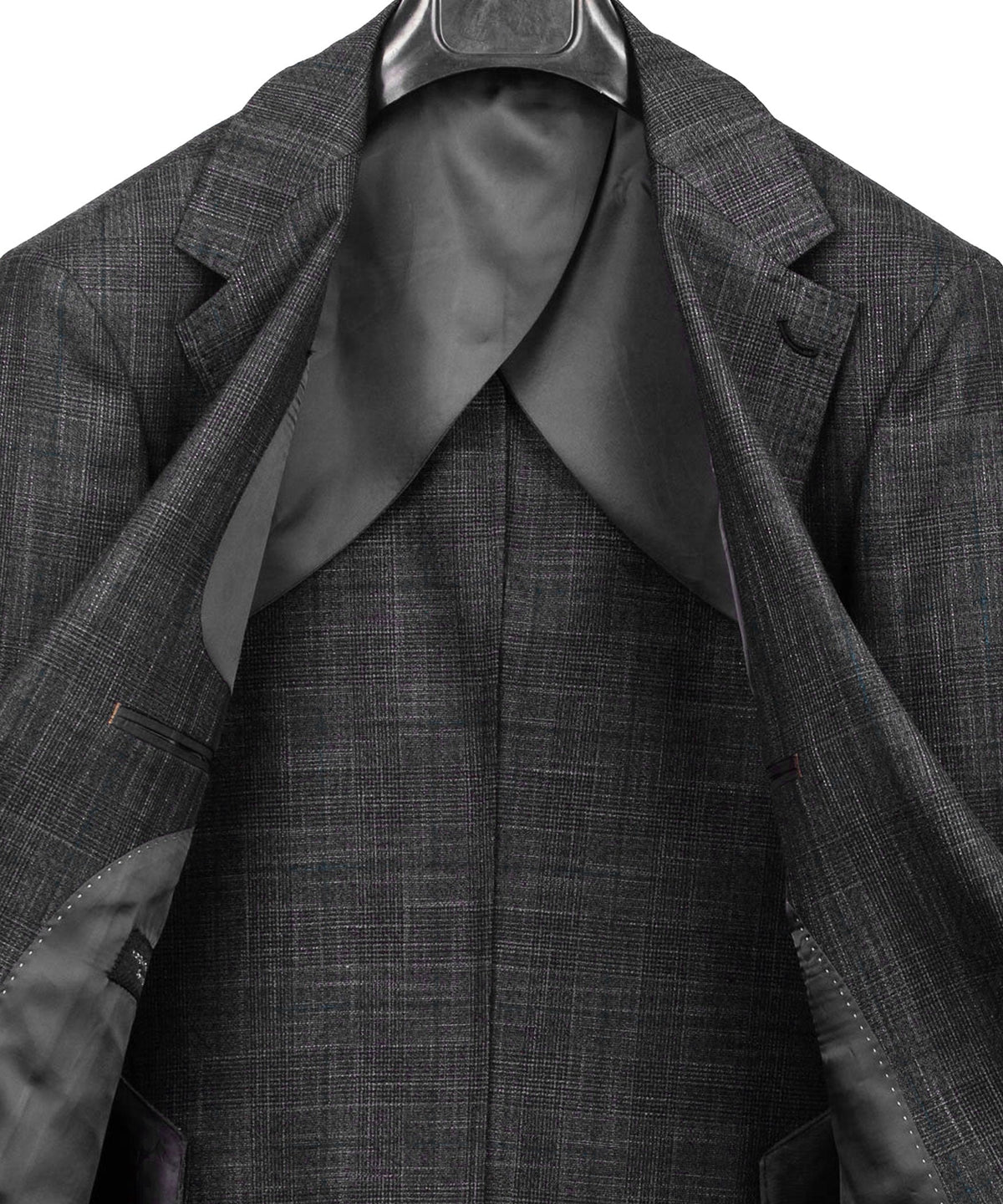 Close-up of dark gray plaid suit jacket lapels with satin lining