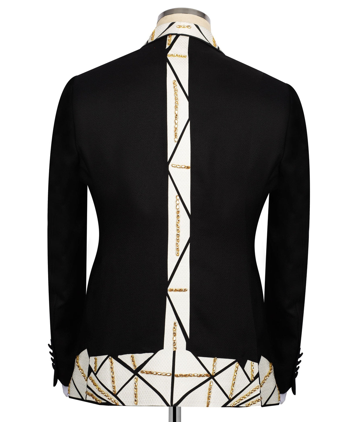 Patchwork tuxedo jacket back: black blazer with white geometric stripe and gold chain accents