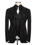 Black tuxedo jacket with bow tie, stone-studded lapels and chest panels
