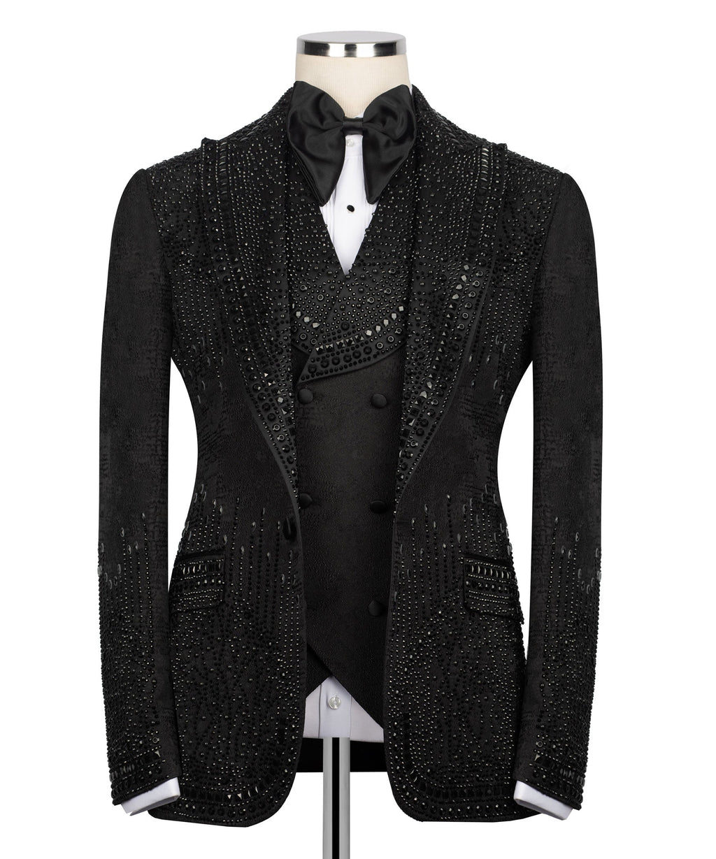 Black embellished tuxedo jacket with satin bow tie, stone-studded lapels and buttons