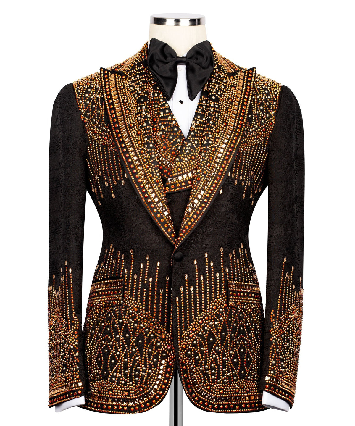 Black tuxedo jacket front view with ornate gold-red stone embroidery and bow tie
