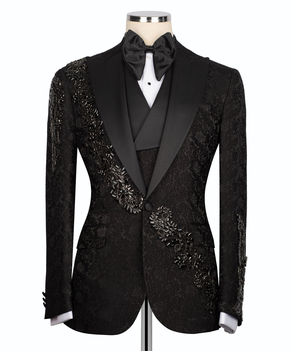 Black tuxedo jacket front view with stone-embroidered trim and satin bow tie