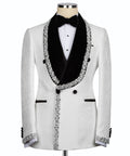White tuxedo jacket with black satin lapels and rhinestone trim, paired with bow tie
