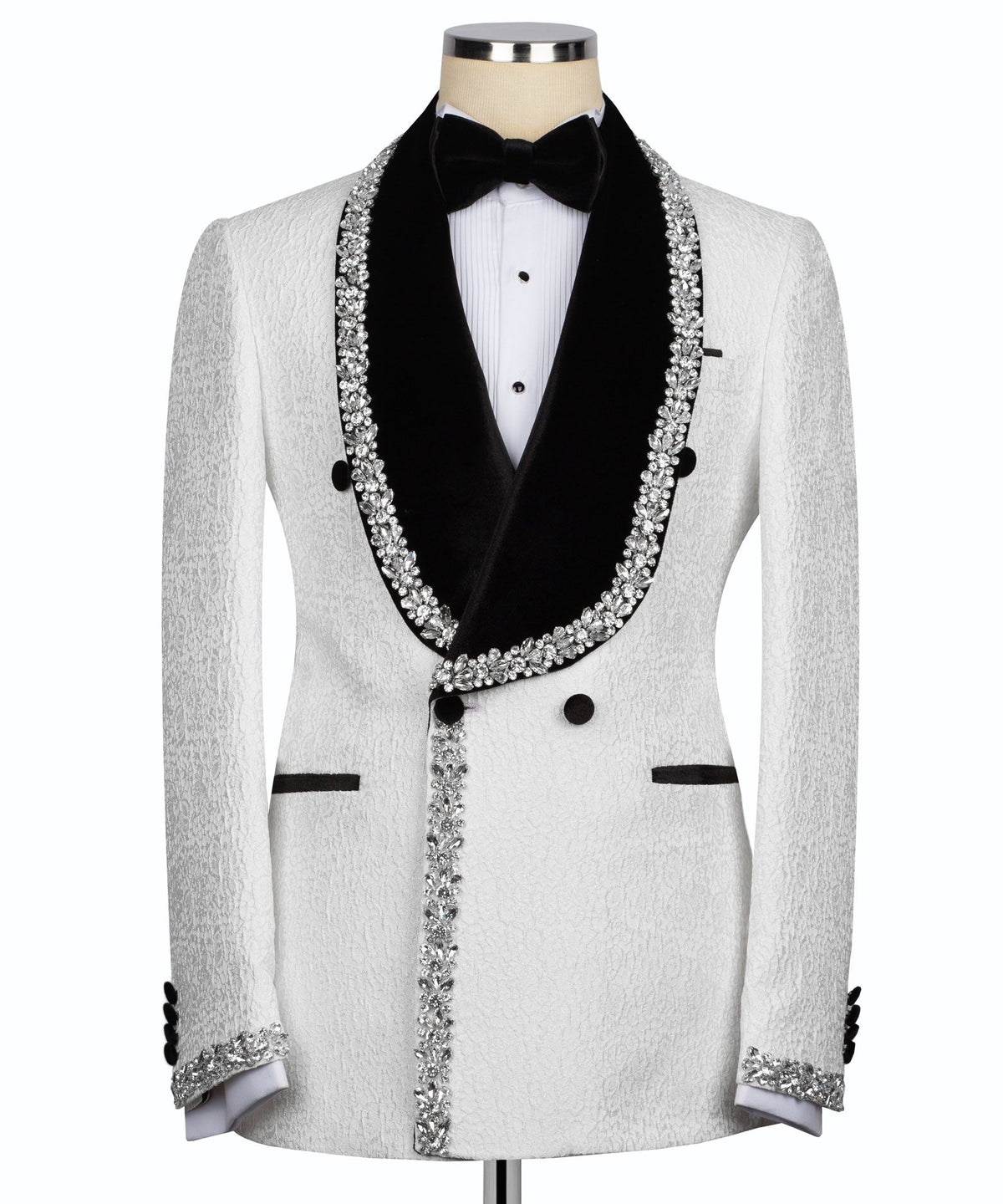 White tuxedo jacket with black satin lapels and rhinestone trim, paired with bow tie
