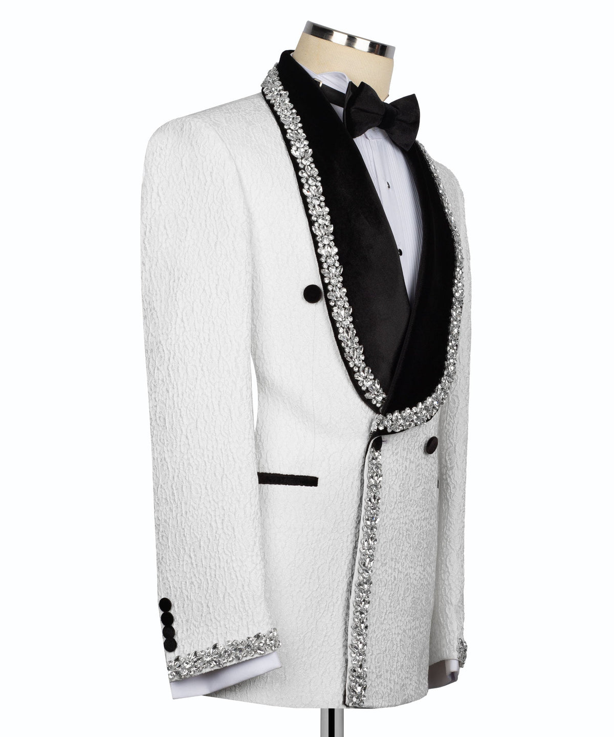Stone-embroidered tuxedo jacket with black bow tie, vest, and rhinestone trim