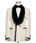 Off-white tuxedo jacket with black satin lapels and stone-embroidered trim
