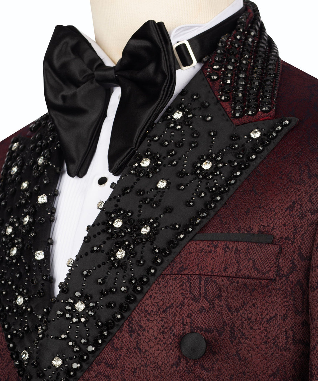 Close-up: black bow tie, white shirt front, and jeweled black embroidered lapel