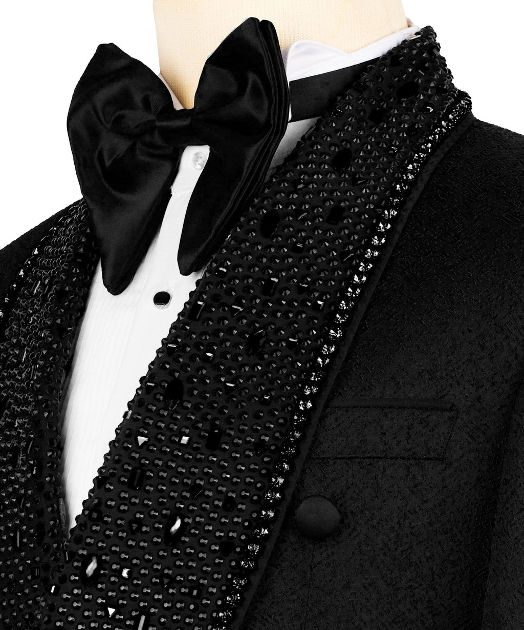 Embroidered black lapel and satin bow tie over white shirtfront
