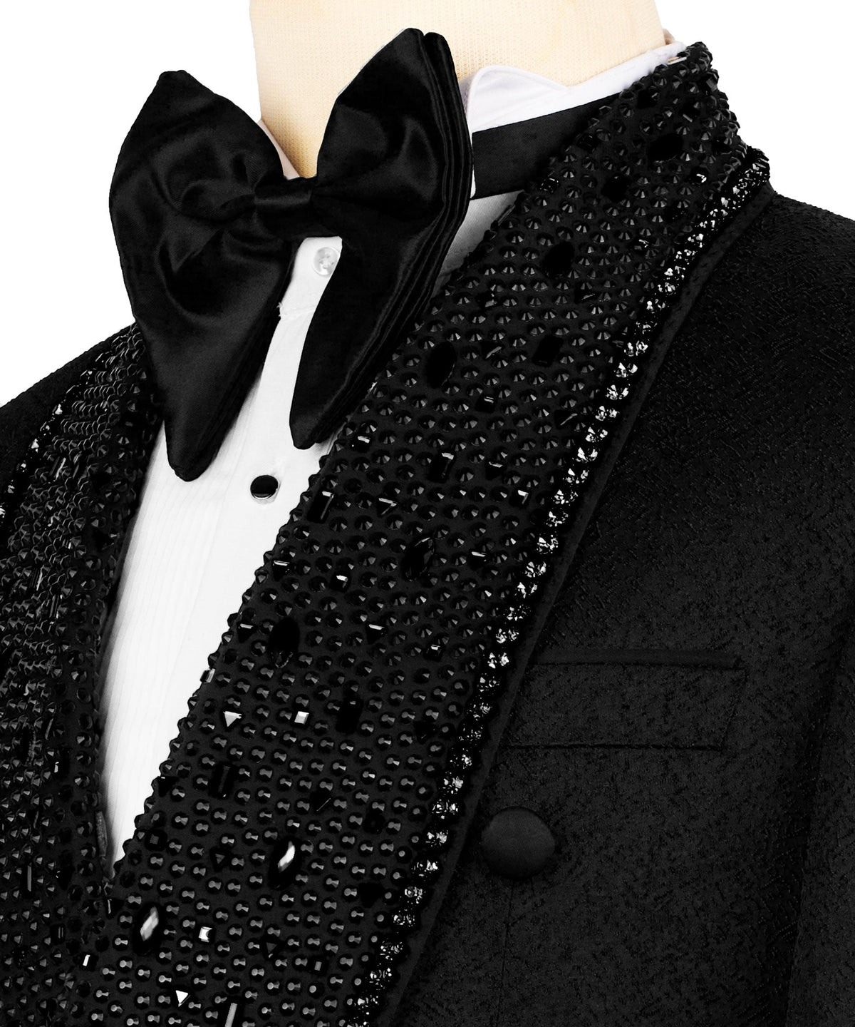 Embroidered black lapel and satin bow tie over white shirtfront