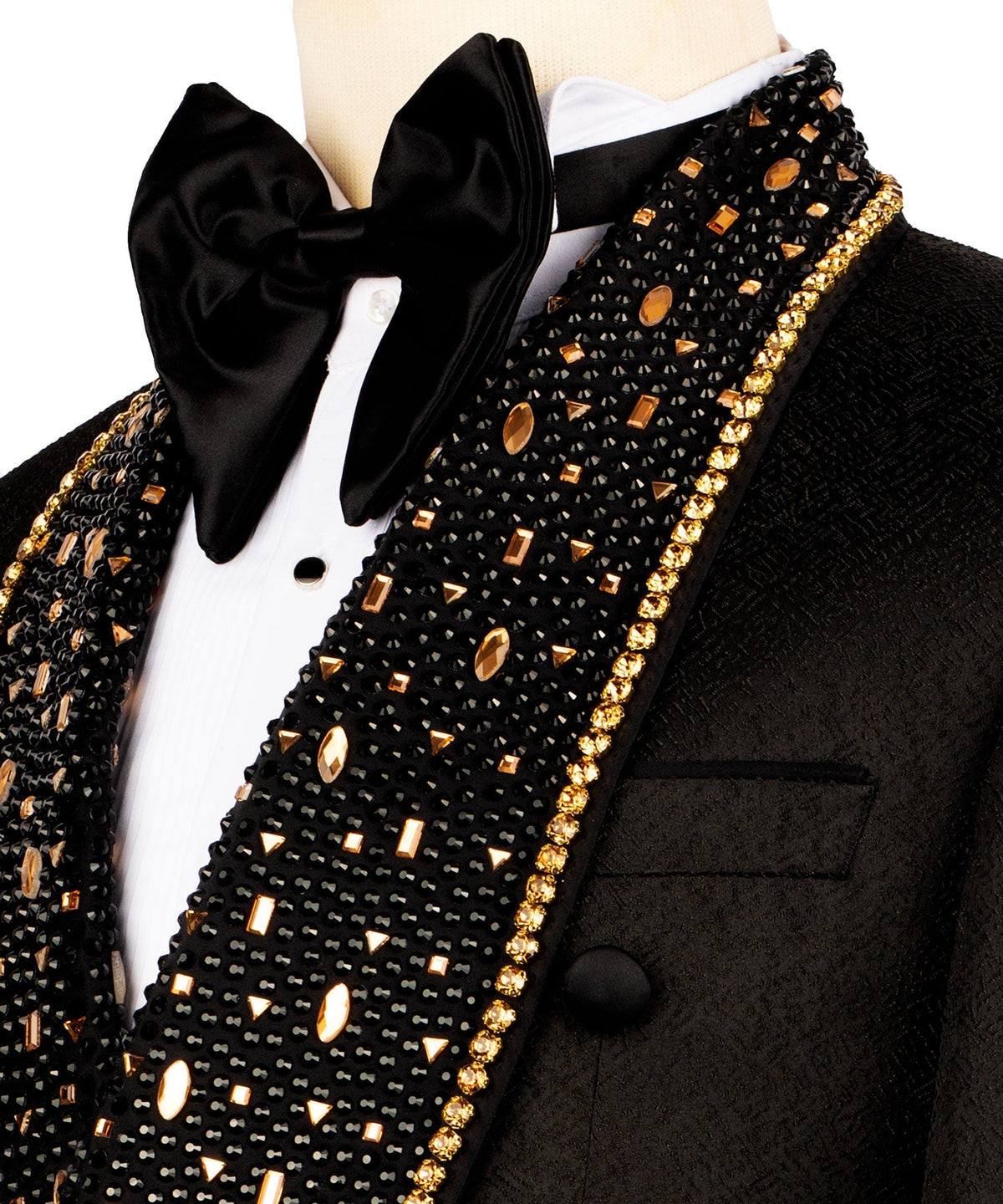 Close-up: black satin bow tie and gold stone-embroidered tuxedo lapels with trim edging