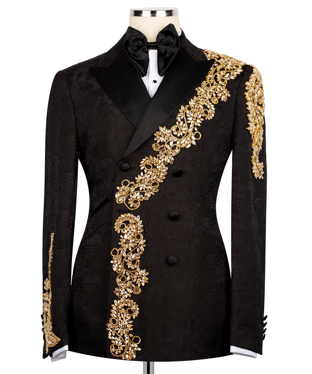 Black tuxedo jacket with gold stone embroidery along lapel and button front, black bow tie
