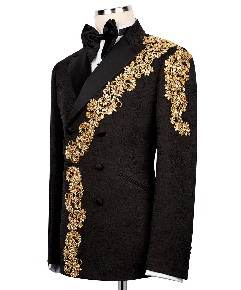 Black tuxedo coat with gold stone-embroidered floral motifs on chest and sleeve, bow tie