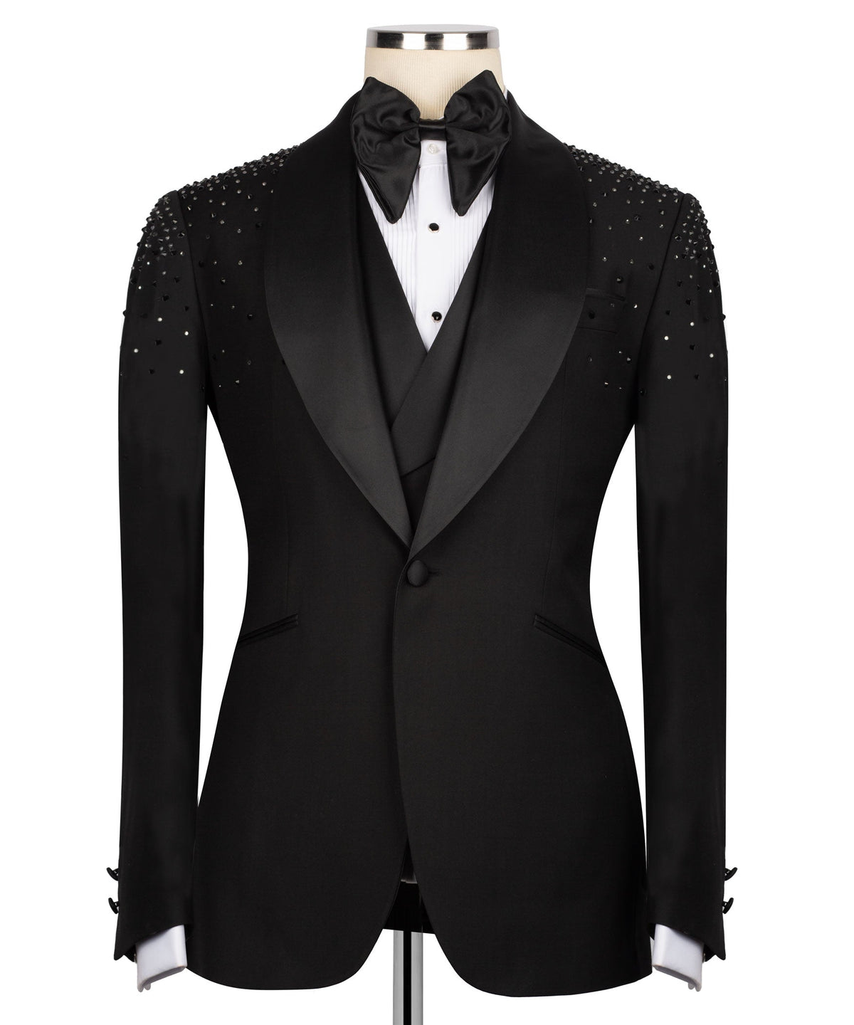 Black tuxedo jacket with jeweled shoulder stonework, satin lapels, and bow tie
