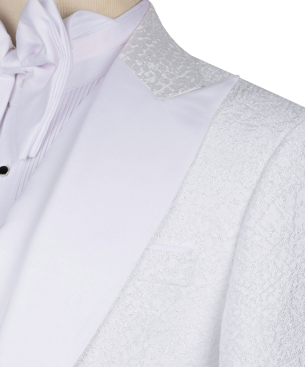 Close-up of white bow collar and textured patterned lapel trim