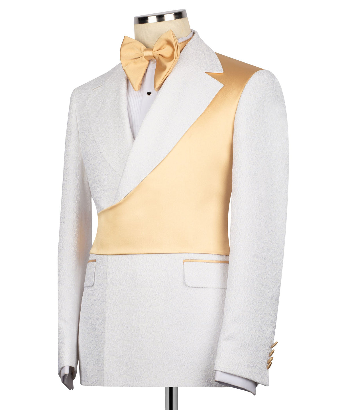 White tuxedo jacket, gold satin vest, and gold bow tie on mannequin