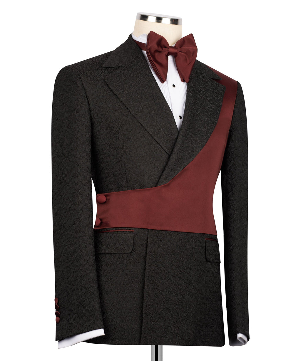 Black tuxedo jacket with notch lapels and maroon vest panel, bow tie