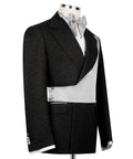 Black tuxedo jacket with light-gray satin vest, white shirt front, and bow tie