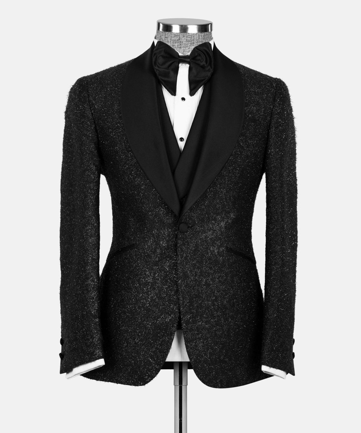 Black glitter tuxedo jacket with satin lapels and bow tie, fitted silhouette