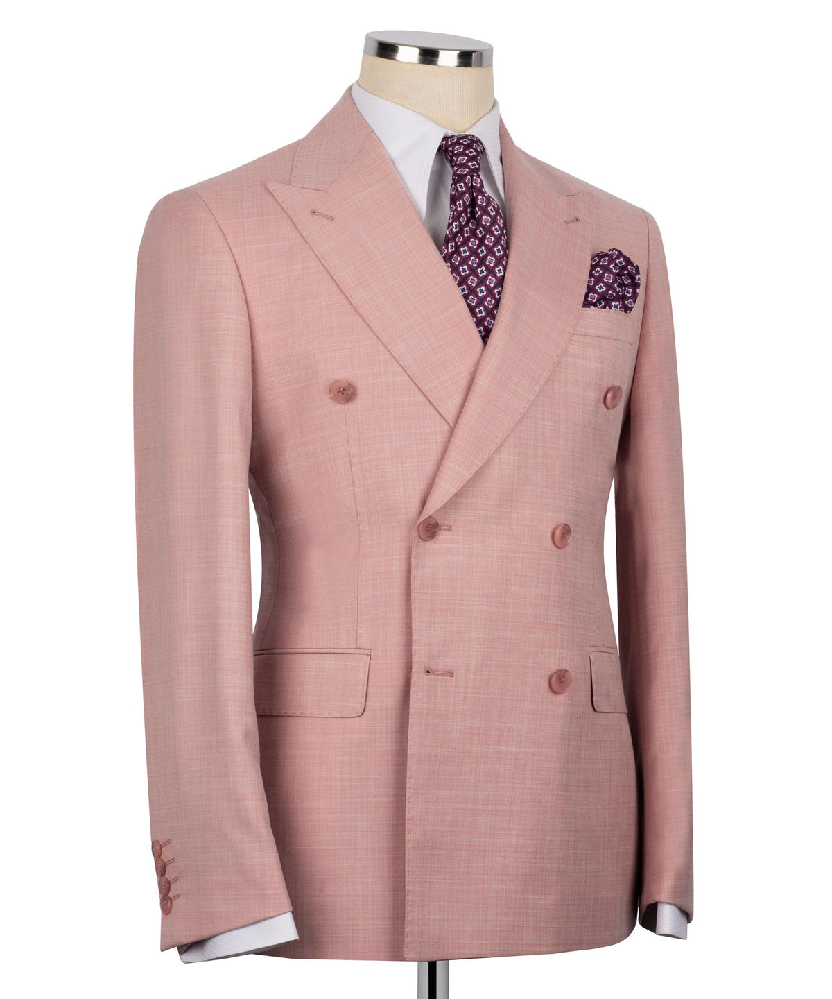 Light pink suit jacket front view, double-breasted with patterned tie and pocket square