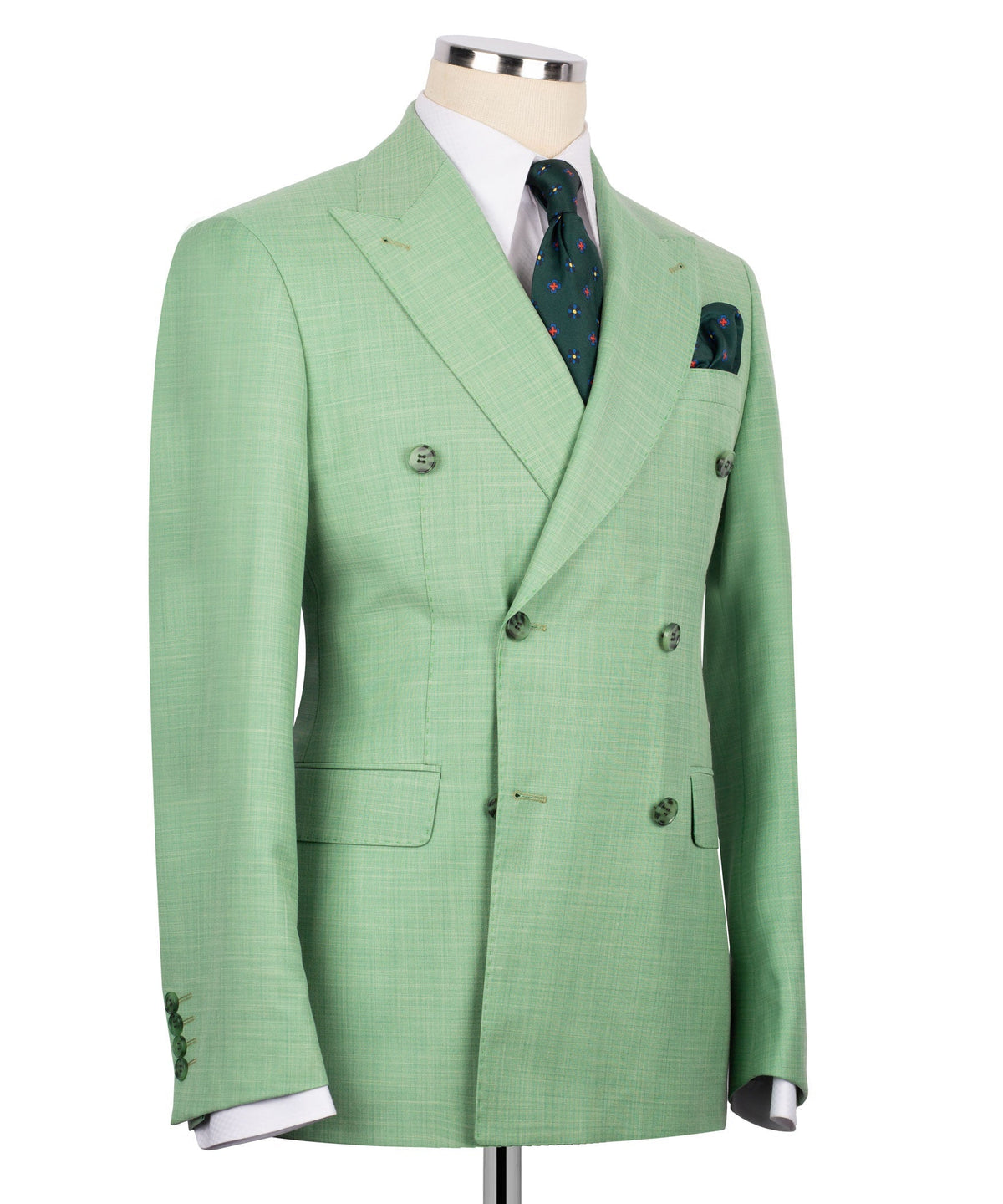 Light green double-breasted blazer with chest pocket, flap welt pockets, and pocket square