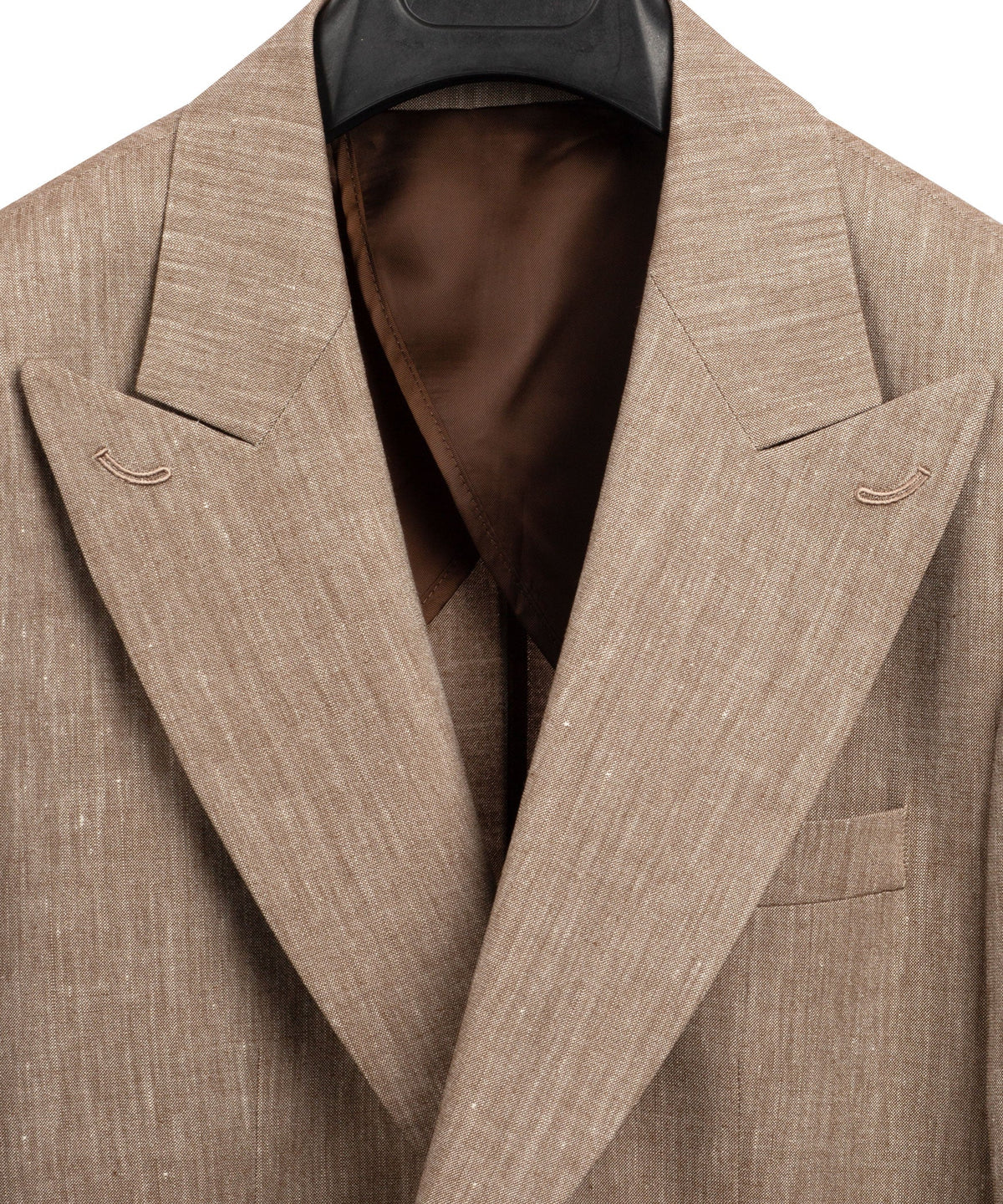Tan linen blazer with V-shaped lapels and matching chest pocket with pocket square