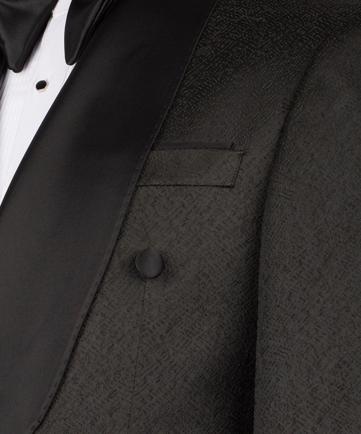 Close-up black shawl-collar tuxedo jacket and waistcoat lapel with buttons