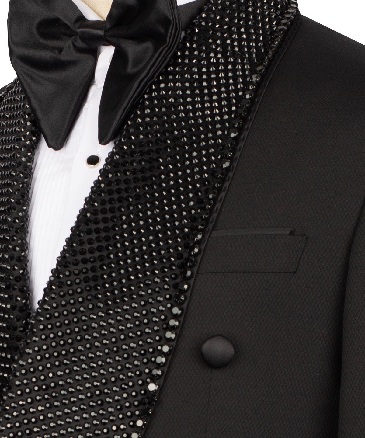 Beaded embroidered lapel detail with black satin bow tie over white shirt front