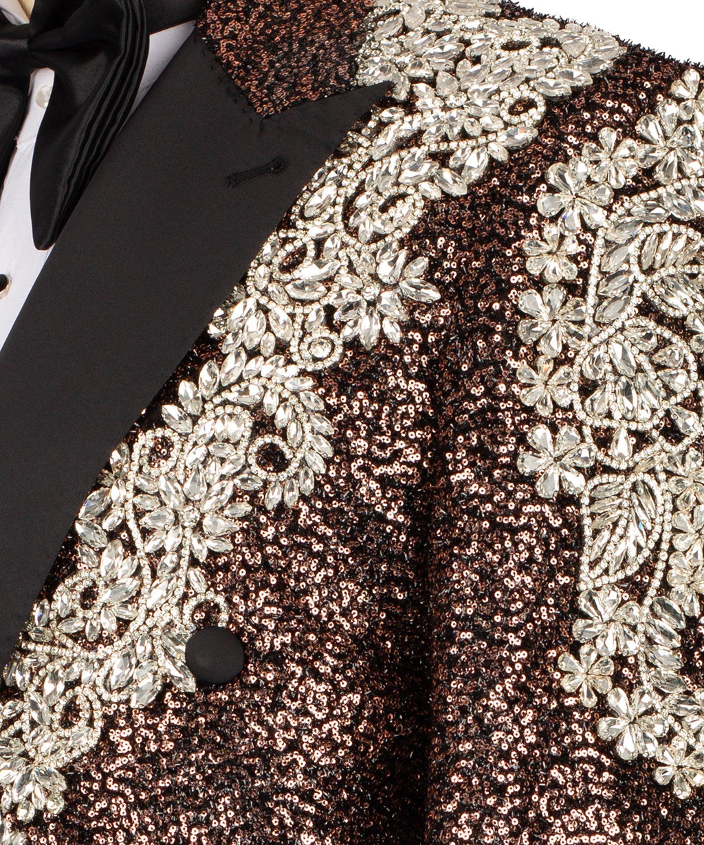 Close-up: bronze sequins with sparkling silver stone applique on the jacket