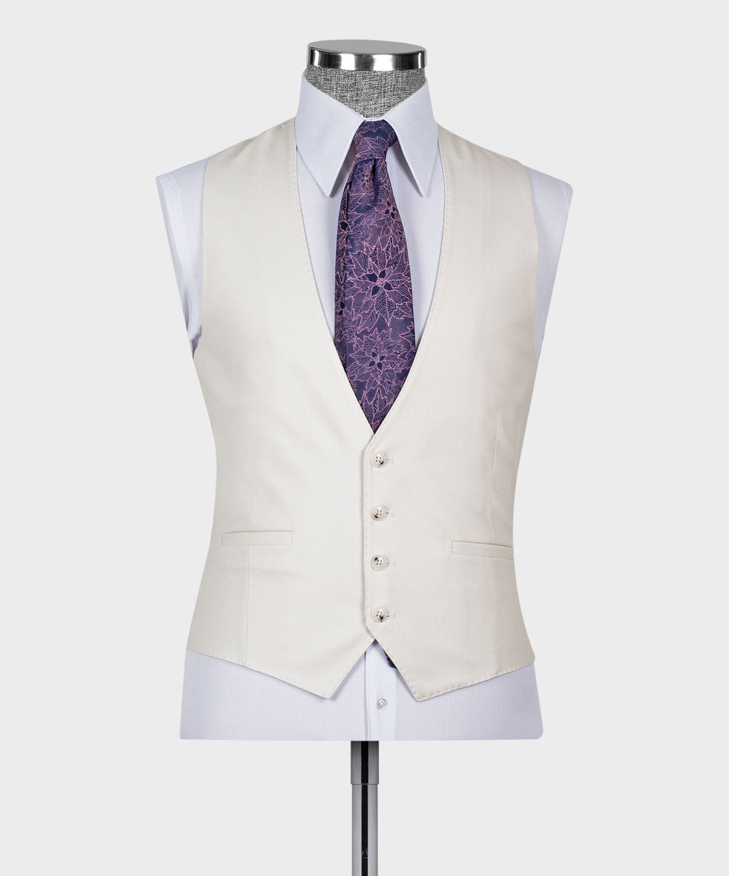 Cream waistcoat front on mannequin with purple patterned tie and buttoned vest closure
