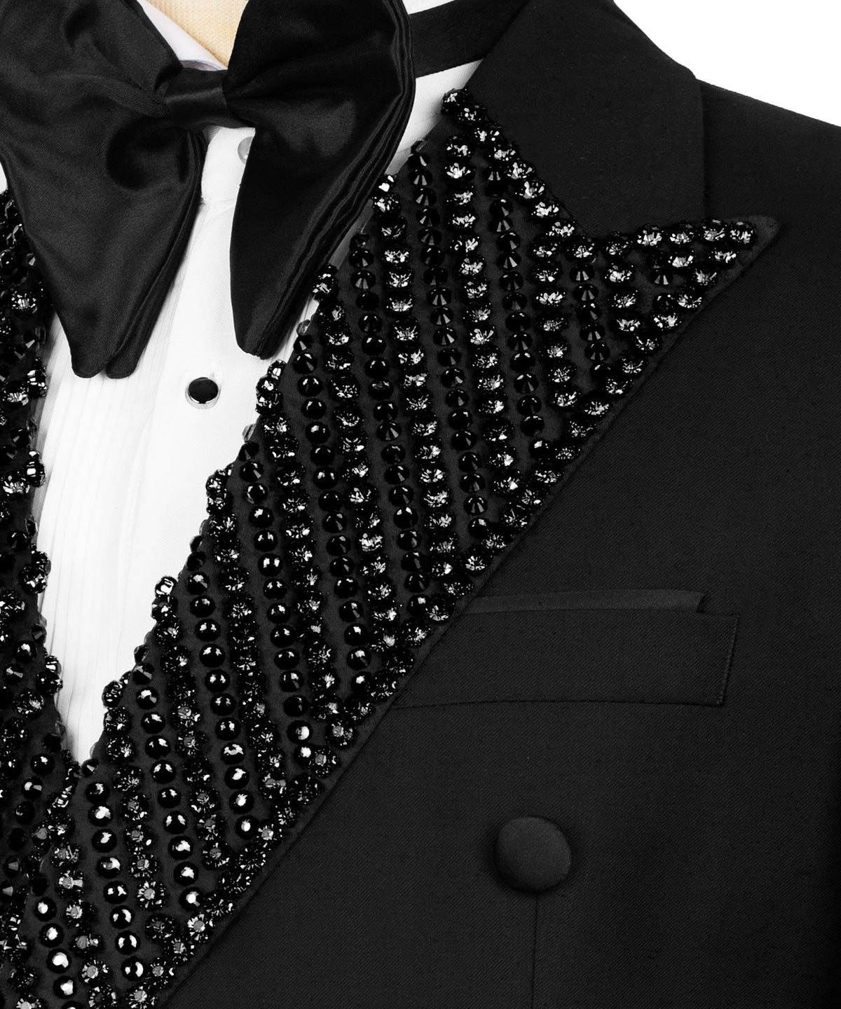 Close-up of black lapel embroidery with rhinestones and satin bow tie