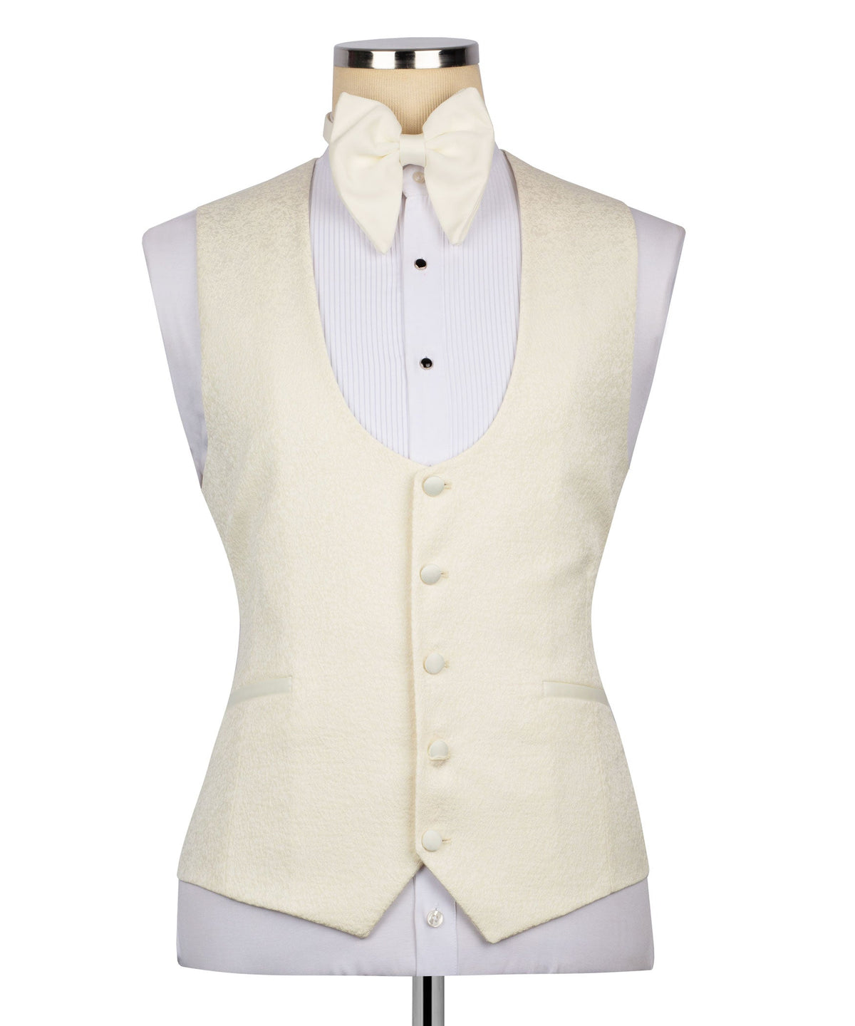 Cream tuxedo waistcoat vest with four-button front, paired with bow tie and jacket